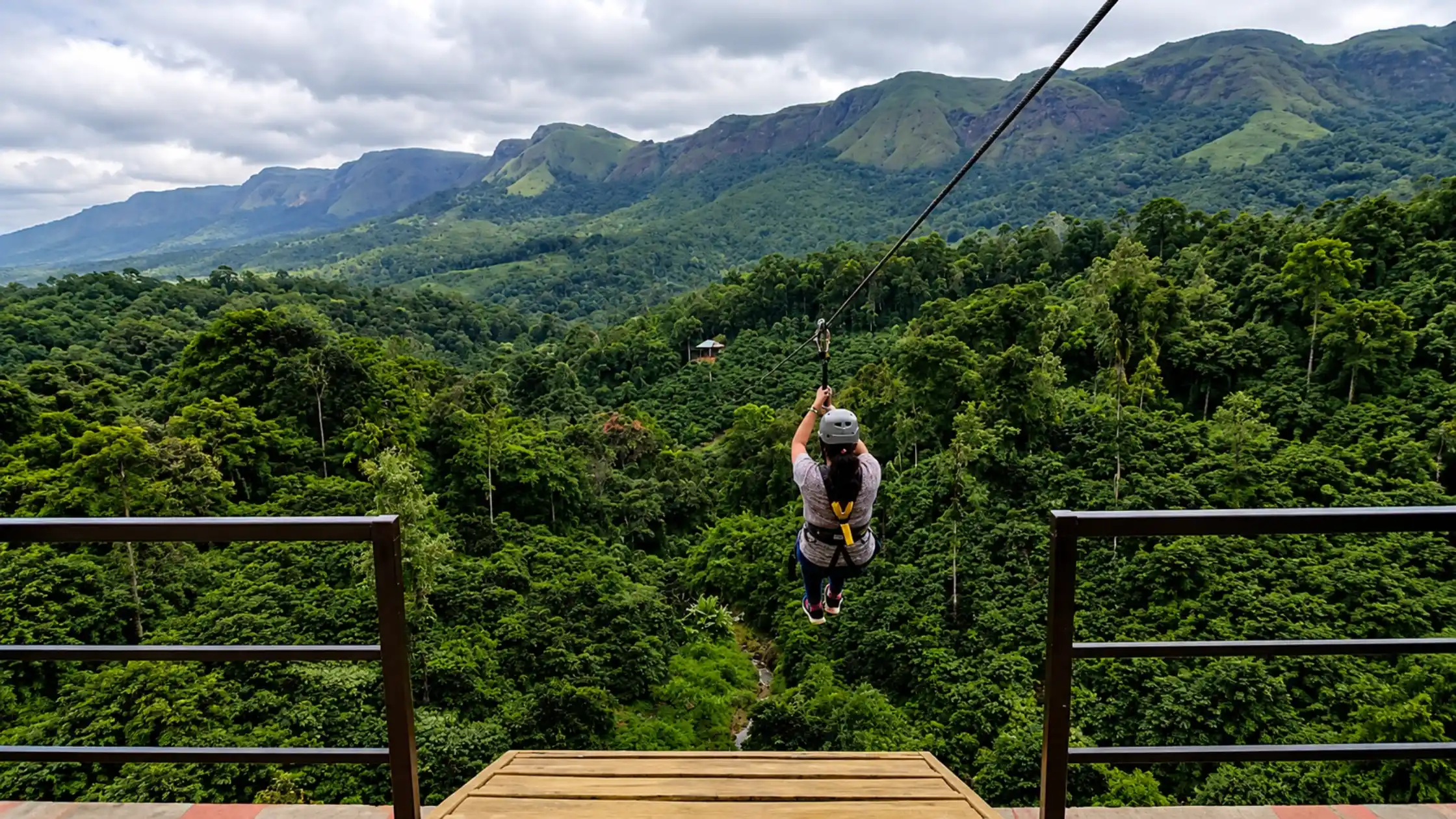 Ziplining through the forest during adventure activities in Sakleshpur.